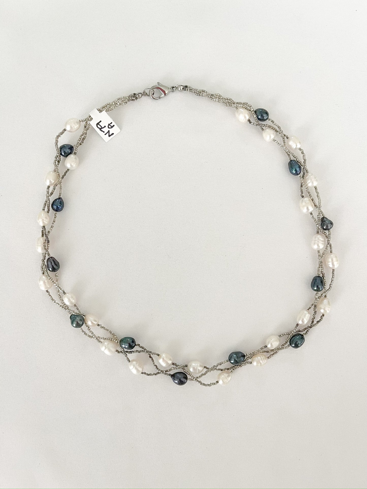 Multi-strand Black and White Pearl Necklace