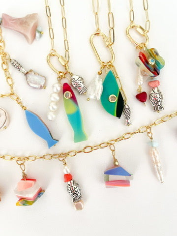 necklaces with fish charms and other charms